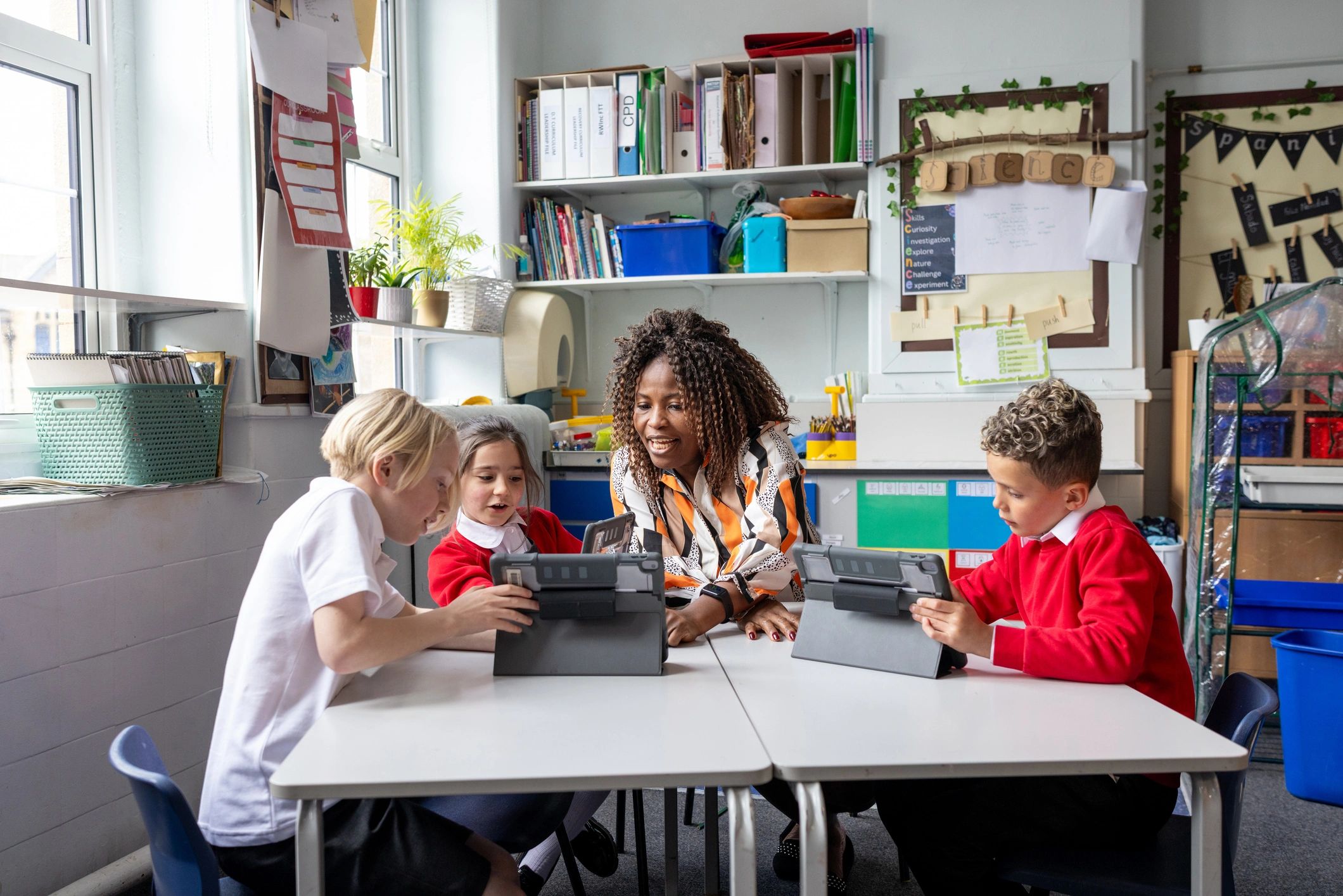 Teachers and Students Using Digital Tablets